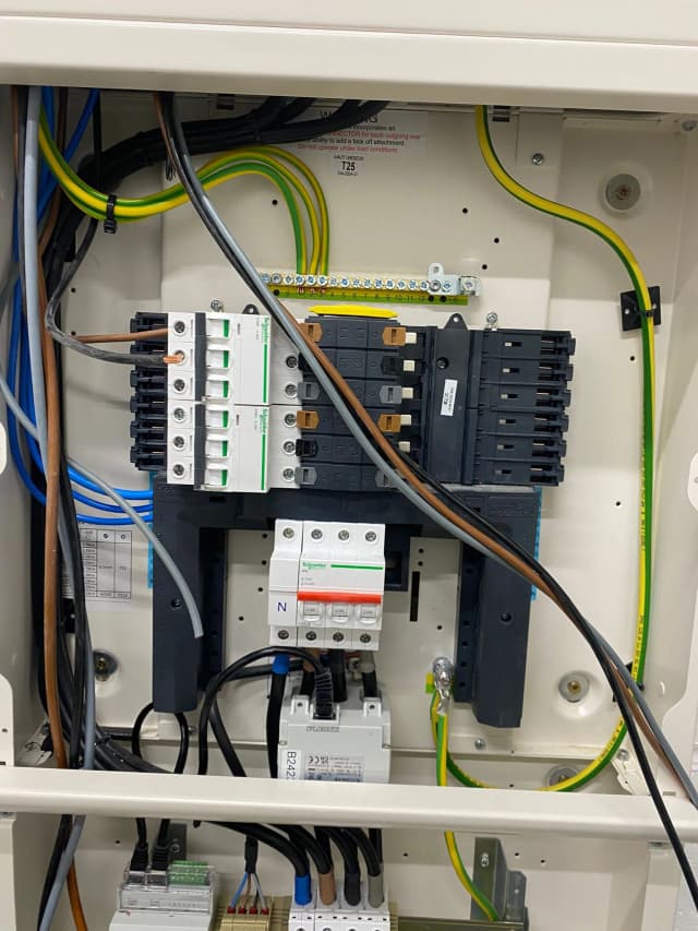 Clean and organized electrical bill box showcasing neatly arranged components and wiring.